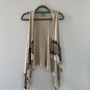 Cute lighter tan shawl with sleeves